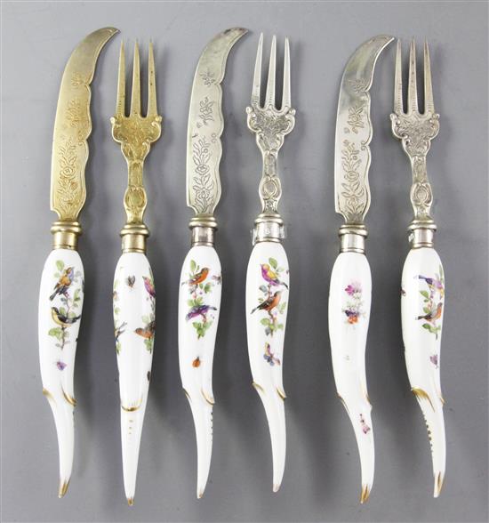 Three pairs of Meissen porcelain handled knives and forks, 19th century, 21cm and 21.5cm
